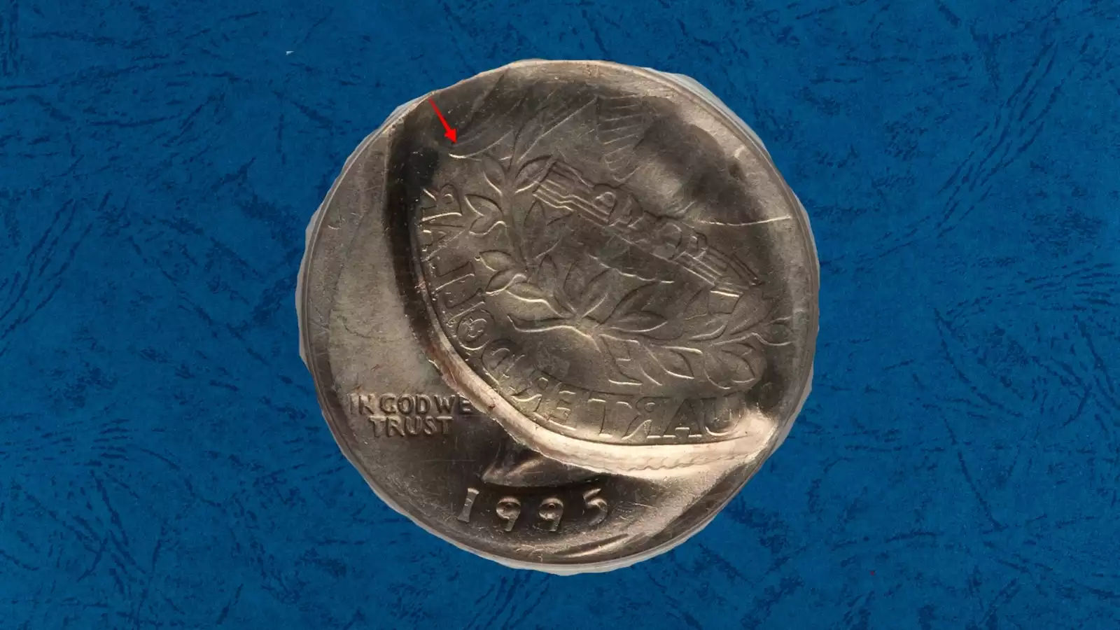 1995 Washington Quarter brockage error showing incuse mirror-image design impression on coin surface